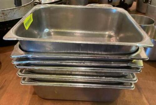 (6) HALF SIZE STAINLESS INSERTS.