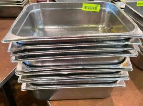 (8) HALF SIZE STAINLESS INSERTS.