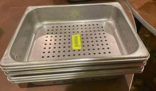 (6) HALF SIZE SLOTTED STAINLESS INSERTS.