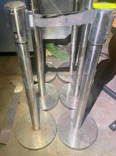 (2) CHROME STANCHION POSTS W/ RETRACTABLE CORD.