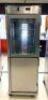 FULL HEIGHT STAINLESS STEEL INSULATED MOBILE HEATED CABINET WITH THROUGH DOORS
