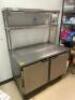 DESCRIPTION: BEVERAGE AIR 48" TWO DOOR WORK TOP COOLER W/ RISER SHELF BRAND / MODEL: BEVERAGE AIR ADDITIONAL INFORMATION 115 VOLT, 1 PHASE. IN WORKING - 2
