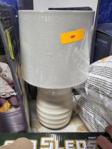 DESCRIPTION: (1) CERAMIC TABLE LAMP INFORMATION: CREAM RETAIL$: $25.00 EA QTY: 1