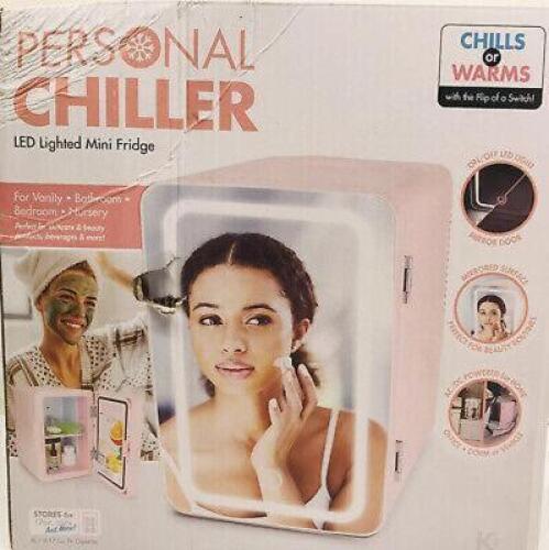 DESCRIPTION: (1) MINI FRIDGE LED LIGHT MIRROR BRAND/MODEL: PERSONAL CHILLER INFORMATION: LED LIGHTED W/MIRROR DOOR, GREAT FOR STORING BEAUTY PRODUCTS