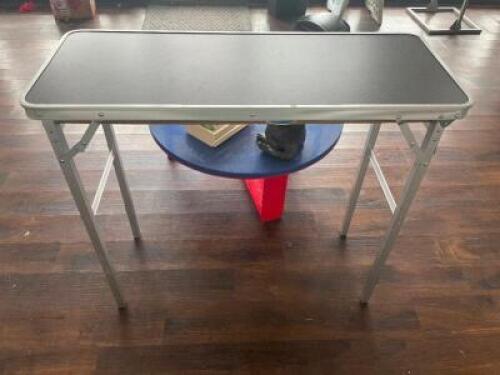 DESCRIPTION: 30" FOLDING TABLE LOCATION: FRONT QTY: 1