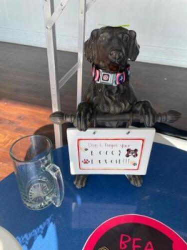 DESCRIPTION: CERAMIC DOG W/ SIGN AND BEER MUG LOCATION: FRONT THIS LOT IS: ONE MONEY QTY: 1