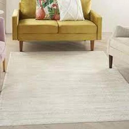 DESCRIPTION: (1) AREA RUG BRAND/MODEL: NOURISON INFORMATION: GREY RETAIL$: $378.28 EA SIZE: 5X7 QTY: 1