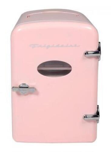 DESCRIPTION: (1) MINI RETRO FRIDGE BRAND/MODEL: FRIGIDAIRE INFORMATION: 9 CAN CAPACITY, PINK, PLUGS INTO 9V CAR ADAPTER OR WALL OUTLET RETAIL$: $39.98