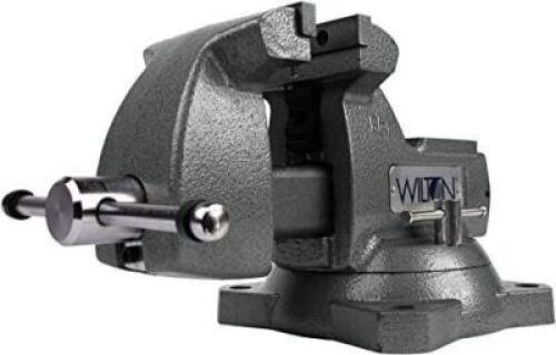 DESCRIPTION: (1) MECHANICS BENCH VISE BRAND/MODEL: WILTON/21400 INFORMATION: WITH SWIVEL BASE/CAST IRON RETAIL$: 384.99 SIZE: 5.25"JAW CAPACITY X 5"JA