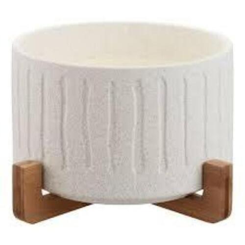 DESCRIPTION: (1) CERAMIC PLANTER WITH STAND BRAND/MODEL: BETTER HOME AND GARDENS INFORMATION: WHITE RETAIL$: $30.00 EA SIZE: 10IN QTY: 1