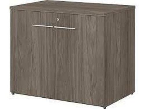 DESCRIPTION: (1) STORAGE CABINET WITH DOORS BRAND/MODEL: BUSH BUSINESS FURNITURE #OFS136MHSU INFORMATION: BROWN RETAIL$: $396.51 EA SIZE: 36" QTY: 1