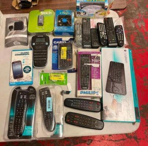 ASSORTED ELECTRONICS AS SHOWN (UNIVERSAL REMOTES, LABEL MAKER, CALCULATOR, PHONE PROTECTORS, ETC.)