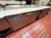 DESCRIPTION: TRUE 67" TWO DOOR PIZZA PREP COOLER. BRAND / MODEL: TRUE TPP-67D-4 ADDITIONAL INFORMATION SN$ 1046366, 115 VOLT, 1 PHASE. MISSING COMPRES - 3