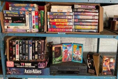 LARGE ASSORTMENT OF VHS TAPES AND VHS PLAYER