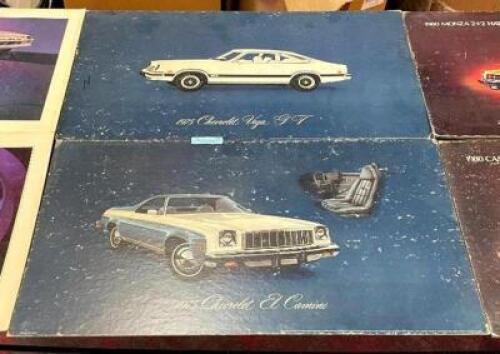 (2) CARDBOARD BACKED VINTAGE CAR POSTERS