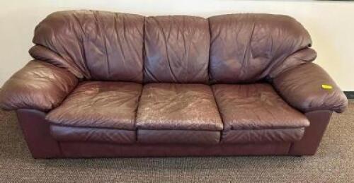 THREE CUSHION MAROON PLEATHER SOFA