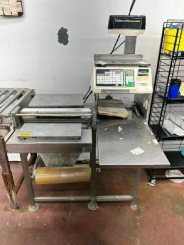 DESCRIPTION: TEC SL-9000 DIGITAL DELI SCALE AND WRAPPING STATION BRAND / MODEL: TEC SL-9000 ADDITIONAL INFORMATION 120 VOLT, 1 PHASE LOCATION: MEAT RO