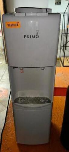 DESCRIPTION: PRIMO WATER COOLER. BRAND / MODEL: PRIMO LOCATION: BACK WAREHOUSE QTY: 1
