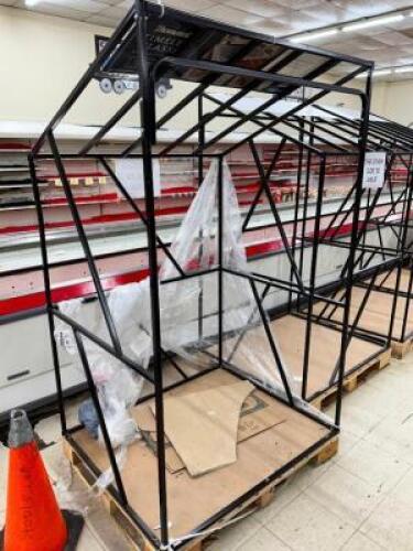 DESCRIPTION: 48" X 48" METAL RUG DISPLAY W/ PALLET BASE. SIZE 48" X 48" X 70" LOCATION: FLOOR QTY: 1