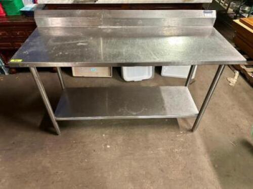 48" X 24" STAINLESS TABLE W/ 4" BACK SPLASH