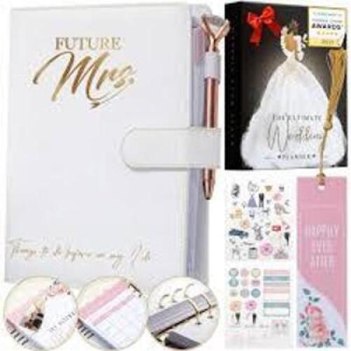 DESCRIPTION: (3) PLANNER BOOK BRAND/MODEL: DELUXE ULTIMATE WEDDING PLANNER BOOK RETAIL$: $32.99 EA QTY: 3
