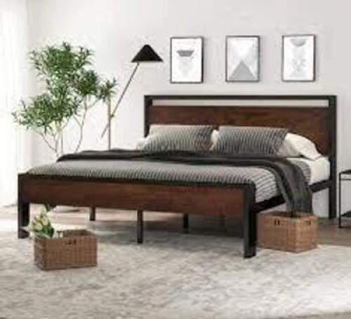 DESCRIPTION: (1) METAL PLATFORM BED FRAME WITH WOODEN HEADBOARD AND FOOTBOARD BRAND/MODEL: SHA CERLIN #SHF04-14 INFORMATION: BLACK AND BROWN RETAIL$:
