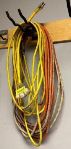 DESCRIPTION: (2) EXTENSION CORDS WITH 3-PRONG SPLITTER LOCATION: TOOL ROOM QTY: 2