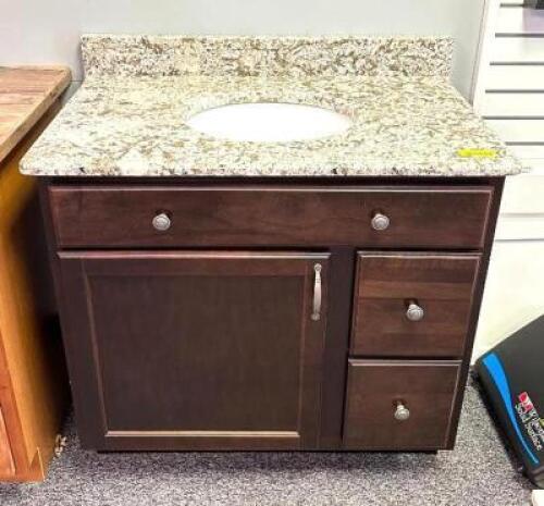 DESCRIPTION: 38" X 22" DECORATIVE BATH VANITY SIZE: 38" X 22" X 36" LOCATION: SHOWROOM