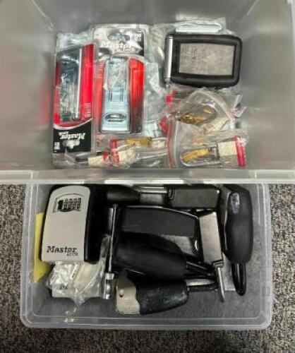 DESCRIPTION: (2) BINS OF ASSORTED LOCKS AND LOCKBOXES LOCATION: BACK OFFICE QTY: 1