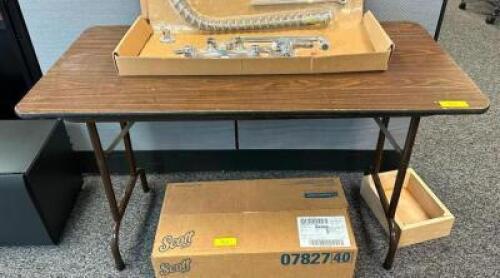 DESCRIPTION: 4' COMPOSITE FOLDING TABLE INFORMATION: CONTENTS NOT INCLUDED SIZE: 48"X24"X29" LOCATION: MAIN OFFICE QTY: 1