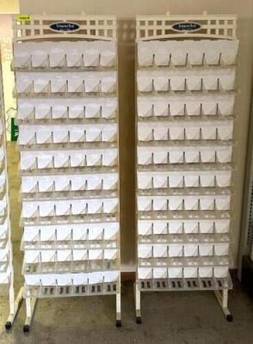 DESCRIPTION: (2) ROLLABOUT SEED DISPLAY RACKS LOCATION: STOCK ROOM QTY: 2