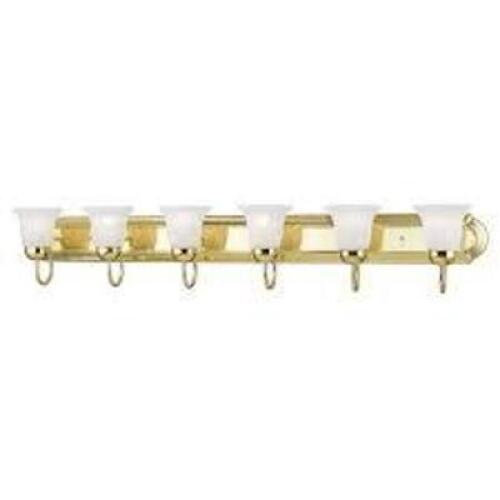 DESCRIPTION: (2) BATHROOM VANITY LIGHT BRAND/MODEL: LIVEX LIGHTING #1076-02 INFORMATION: POLISHED BRASS RETAIL$: $400.00 EA SIZE: 6 LIGHT QTY: 2