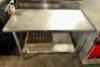 DESCRIPTION: 48" X 30" STAINLESS TABLE W/ MOUNTED CAN OPENER ADDITIONAL INFORMATION W/ 4" BACK SPLASH LOCATION: BAY 7 QTY: 1