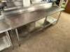 DESCRIPTION: 8' X 24" ALL STAINLESS TABLE W/ 4" BACK SPLASH ADDITIONAL INFORMATION W/ UNDER SHELF. SIZE 8' X 24" LOCATION: BAY 7 QTY: 1