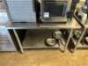 DESCRIPTION: 48" X 30" STAINLESS TABLE W/ 4" BACK SPLASH ADDITIONAL INFORMATION W/ UNDER SHELF. LOCATION: BAY 7 QTY: 1 - 3