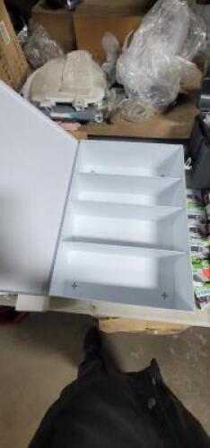 DESCRIPTION: (1) WALL MOUNT FIRST AID CABINET INFORMATION: WHITE RETAIL$: $48.95 EA SIZE: 4 SHELF QTY: 1