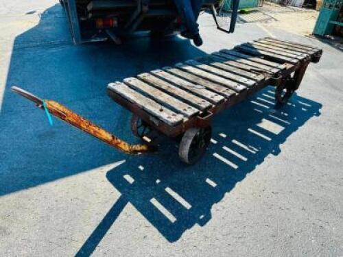 DESCRIPTION: HEAVY DUTY IRON RAILROAD WAGON WITH IRON BASE AND ROLLING WHEELS SIZE: 8' X 29" X 22" QTY: 1
