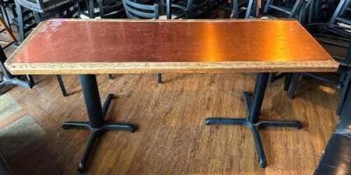 DESCRIPTION: 72" X 24" WOODEN DINING TABLE (TABLE END IS DAMAGED AND MISSING END CAP, SEE PHOTOS) SIZE: 72" X 24"