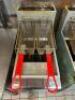 DESCRIPTION: 50 LB. NATURAL GAS FRYER ON CASTERS WITH BASKETS BRAND/MODEL: MAIN STREET 541FF50N LOCATION: KITCHEN QTY: 1 - 5