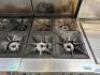 DESCRIPTION: 4-BURNER NATURAL GAS RANGE WITH OVEN ON CASTERS BRAND/MODEL: VULCAN LOCATION: KITCHEN QTY: 1 - 4