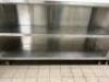 DESCRIPTION: 5' STAINLESS STEEL WORK TABLE WITH STAINLESS SHELVING STORAGE SIZE: 60"X15"X35" LOCATION: KITCHEN QTY: 1 - 4