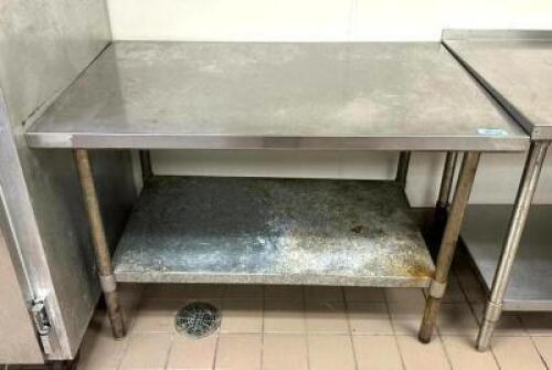 DESCRIPTION: 48" STAINLESS STEEL TABLE WITH GALVANIZED UNDERSHELF SIZE: 48"X30"X33.5" LOCATION: KITCHEN QTY: 1