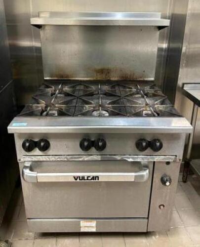 DESCRIPTION: 6-BURNER NATURAL GAS RANGE WITH OVEN AND BACKSPLASH ON CASTERS BRAND/MODEL: VULCAN LOCATION: KITCHEN QTY: 1