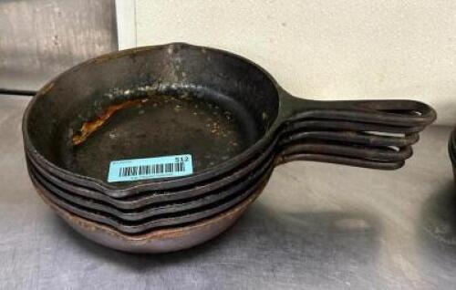 DESCRIPTION: (5) 8" CAST IRON PANS LOCATION: KITCHEN QTY: 5