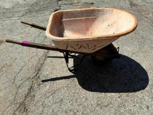 DESCRIPTION: 6 CU. FT HEAVY DUTY WHEELBARROW - ORANGE / FADED SIZE 6 CU. FT LOCATION: BUILDING 4 QTY: 1