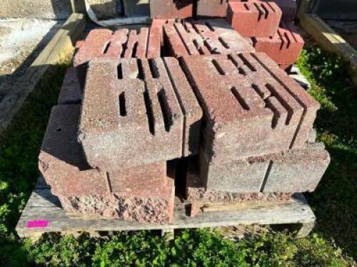 DESCRIPTION: (16) VERSA LOCK RED RETAINING WALL BLOCKS LOCATION: BUILDING 5 / OUTSIDE THIS LOT IS: SOLD BY THE PIECE QTY: 16