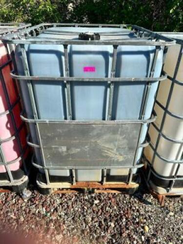 DESCRIPTION: 275 GALLON LIQUID SHIPPING TOTE W/ CAGE. - EMPTY LOCATION: BUILDING 2 / OUTSIDE QTY: 1