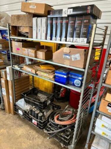 DESCRIPTION: SHELF AND CONTENTS - ASSORTED AUTOMOTIVE AND MOWER PARTS. ADDITIONAL INFORMATION SEE ADDITIONAL PHOTOS LOCATION: BUILDING 6 THIS LOT IS: