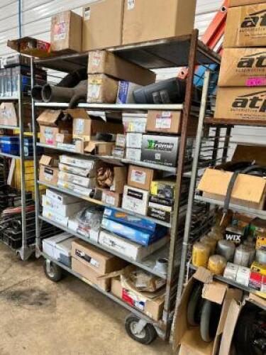 DESCRIPTION: SHELF AND CONTENTS - ASSORTED AUTOMOTIVE AND MOWER PARTS. ADDITIONAL INFORMATION SEE ADDITIONAL PHOTOS LOCATION: BUILDING 6 THIS LOT IS: