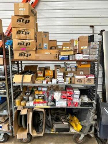 DESCRIPTION: SHELF AND CONTENTS - ASSORTED AUTOMOTIVE AND MOWER PARTS. ADDITIONAL INFORMATION SEE ADDITIONAL PHOTOS LOCATION: BUILDING 6 THIS LOT IS:
